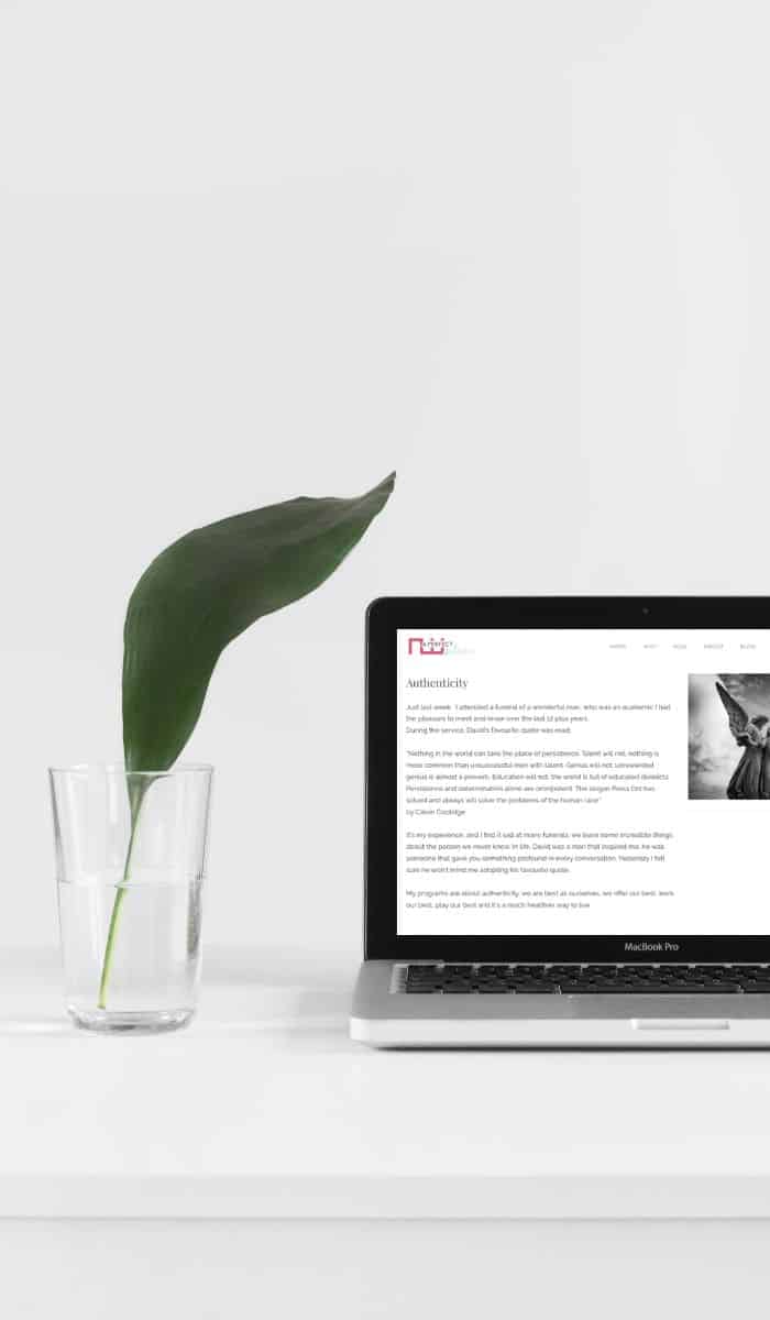 sincere copy mock up content marketing example laptop on table mug notebook leafy indoor plant web designer